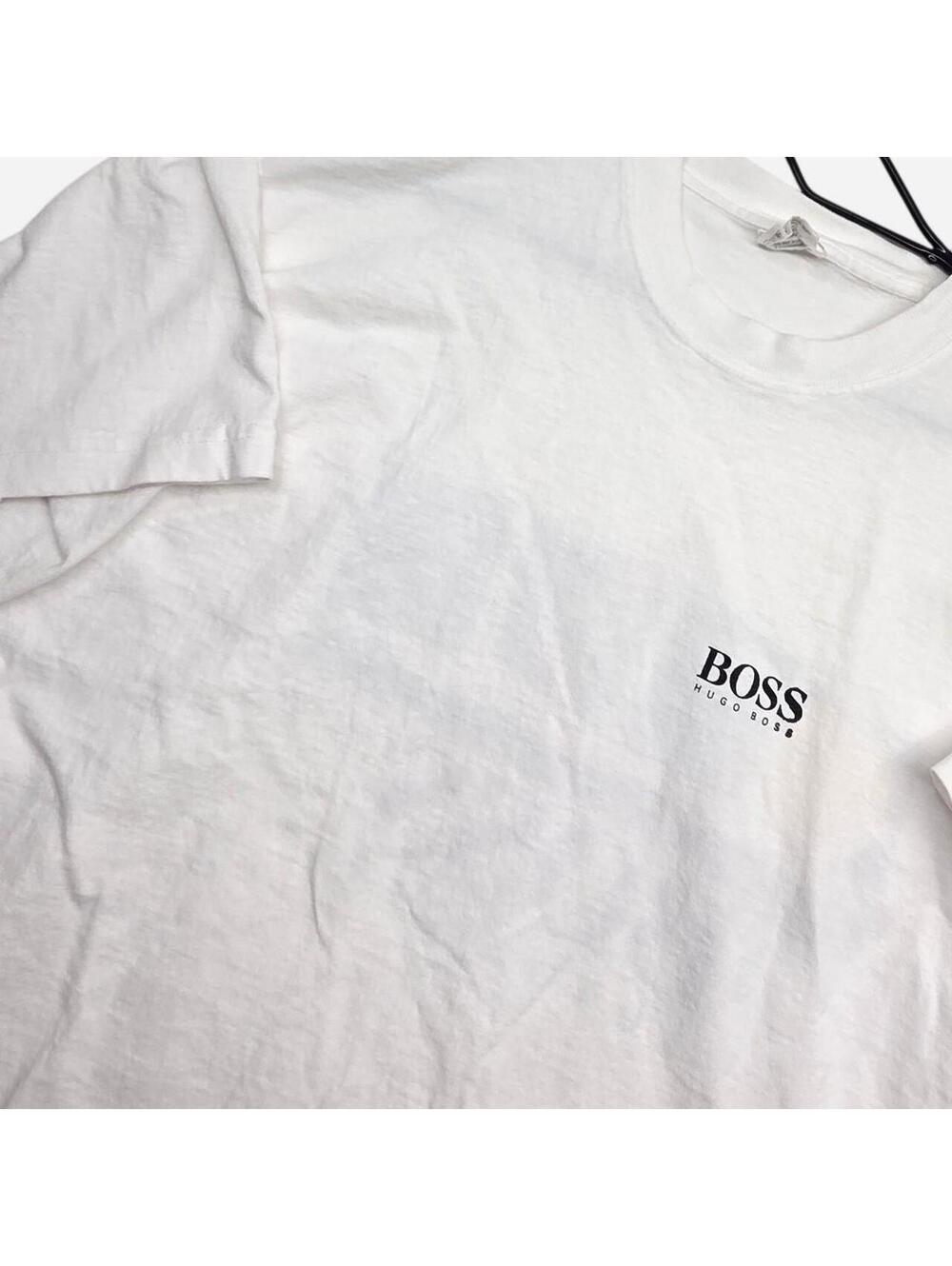 vintage white Hugo Boss t-shirt featuring a black embroidered logo on the chest.